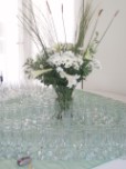 Sherry glasses, flowers in entrance hall